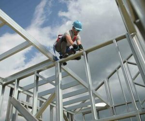 safety-harness-equipment-caucasian-contractor-in-his-30s-on-a-steel-building-frame-working-at-height-concept-video